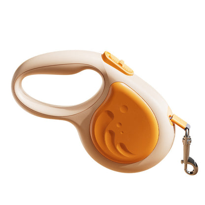 Beige and orange retractable dog leash on a white background