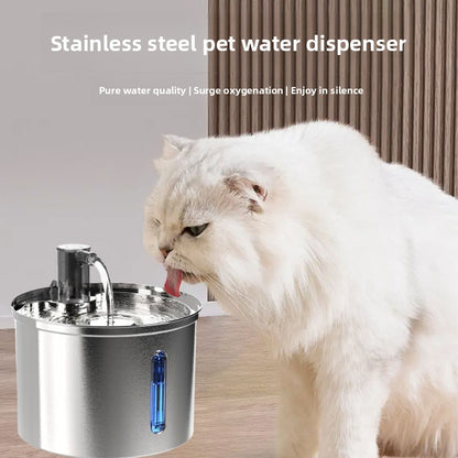 Cat drinking from a stainless steel pet water dispenser with text about water quality and oxygenation.