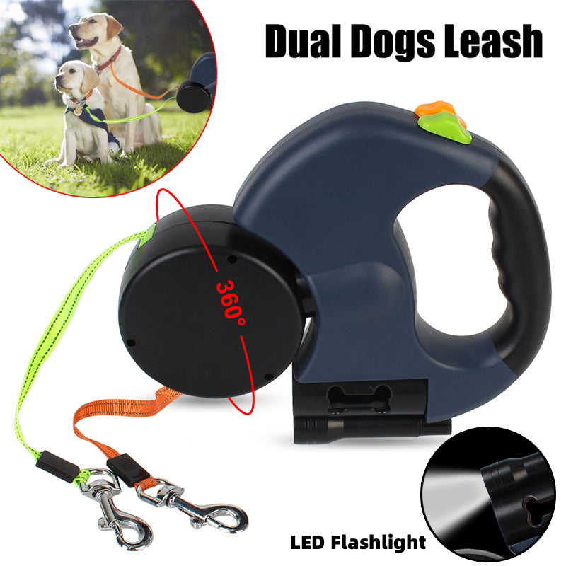 Retractable dog leash with LED flashlight and 360-degree feature, shown with two dogs on grass.